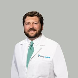 Professional headshot of Alex George, MD 