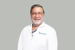 Professional headshot of Andrew Hughes, MD
