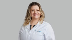 Professional headshot of Holly Wyder, MD