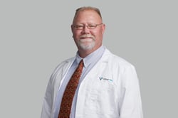 Professional headshot of John Graham, MD