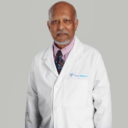 Professional headshot of Mushtaque Ahmed, MD