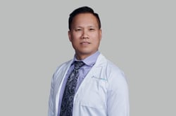 Professional headshot of Binh Tran, MD