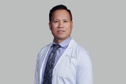 Professional headshot of Binh Tran, MD