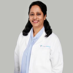 Professional headshot of Mini Chennemkara, FNP-C