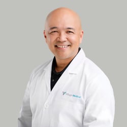 Professional headshot of Alfredo Ermac, MD 