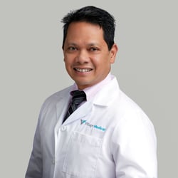 Professional headshot of Froilan Francisco, MD