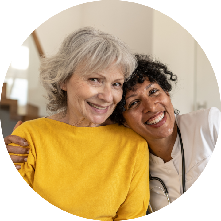 Provider and patient hugging and smiling 