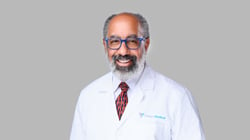 Professional headshot of Ramon Reyes, MD