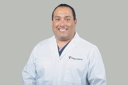 Professional headshot of Alex Seda, MD