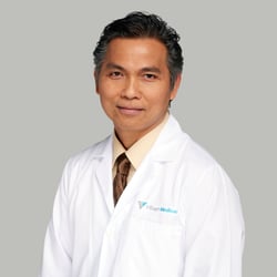 Professional headshot of Alan Tran, MD